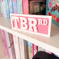 Pink TBR Bookshelf Sign